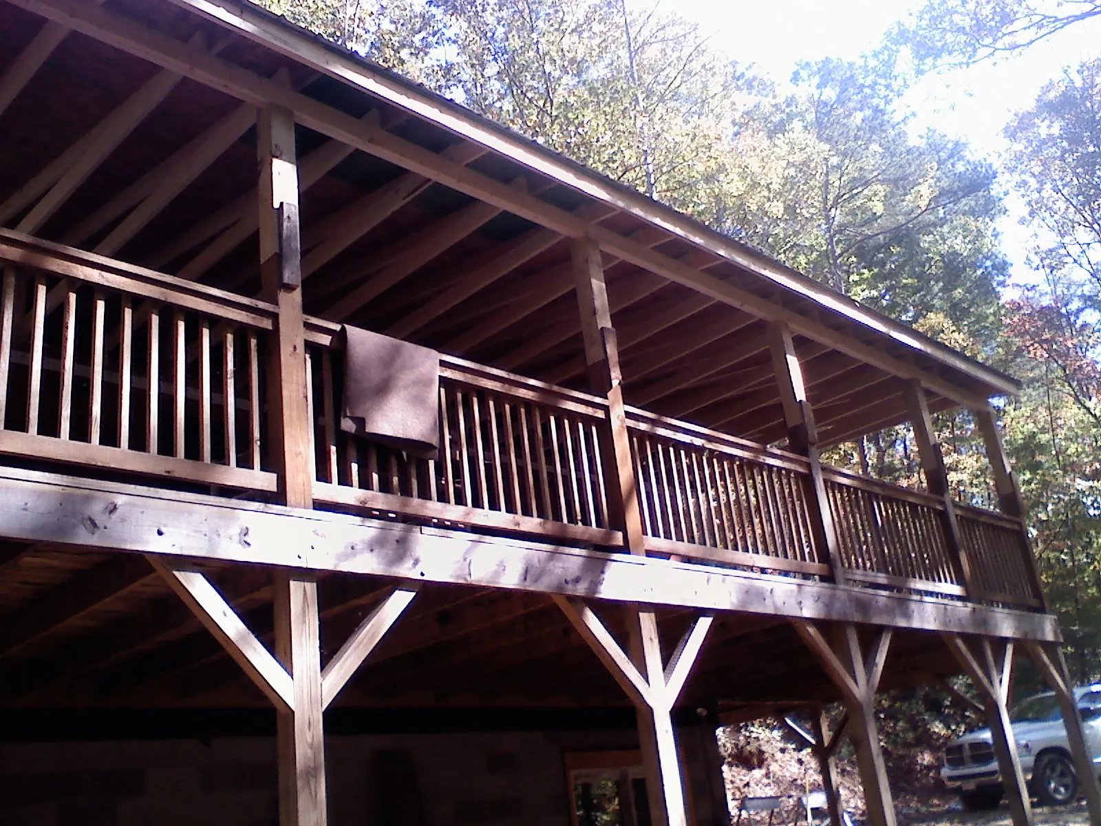Timber framing under a new elevated porch and deck — Roof Leak Repair in Cuba by Roofing Brothers